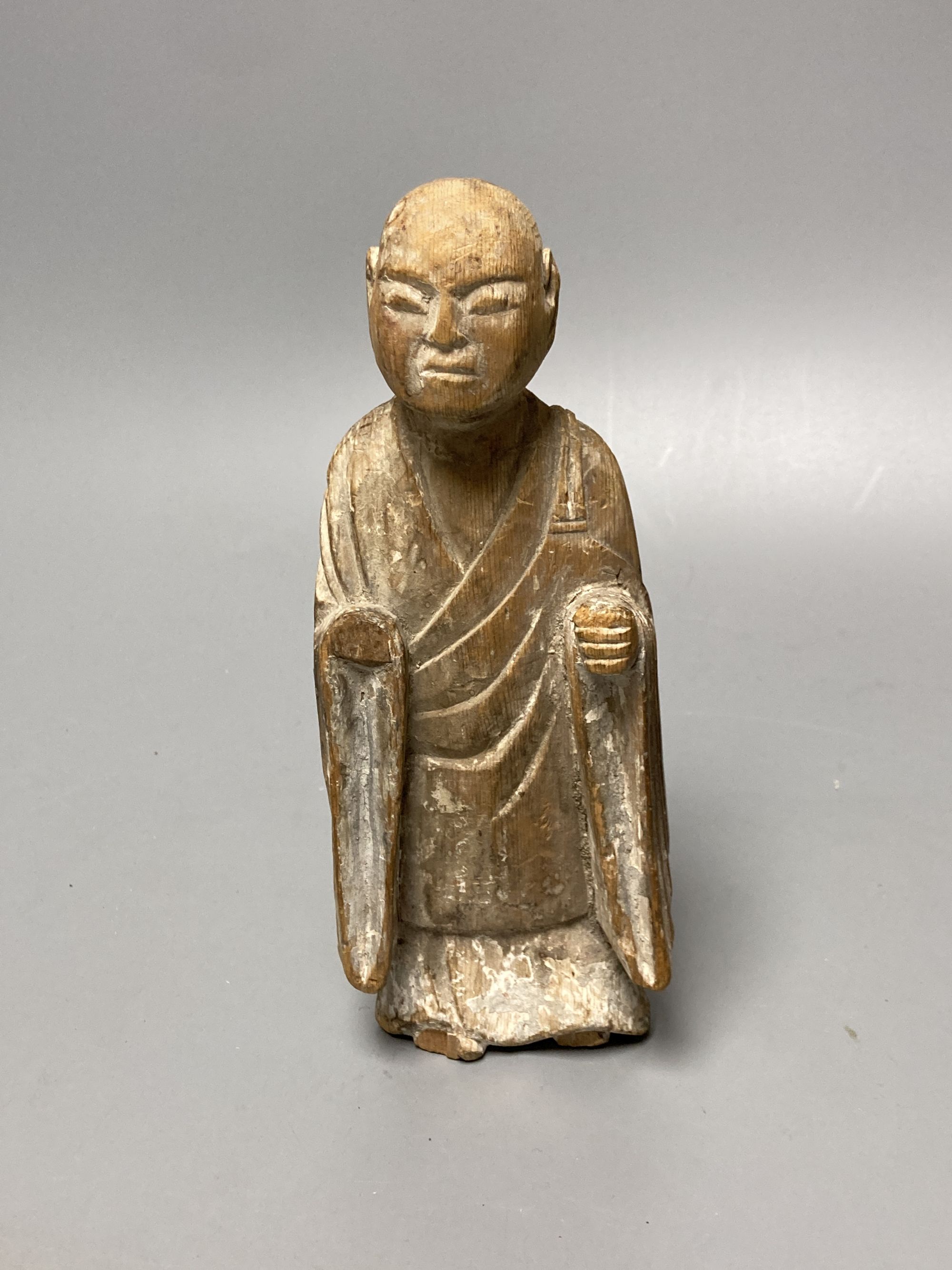 A Japanese polychrome wood figure, probably 14th / 16th century, height 20cm